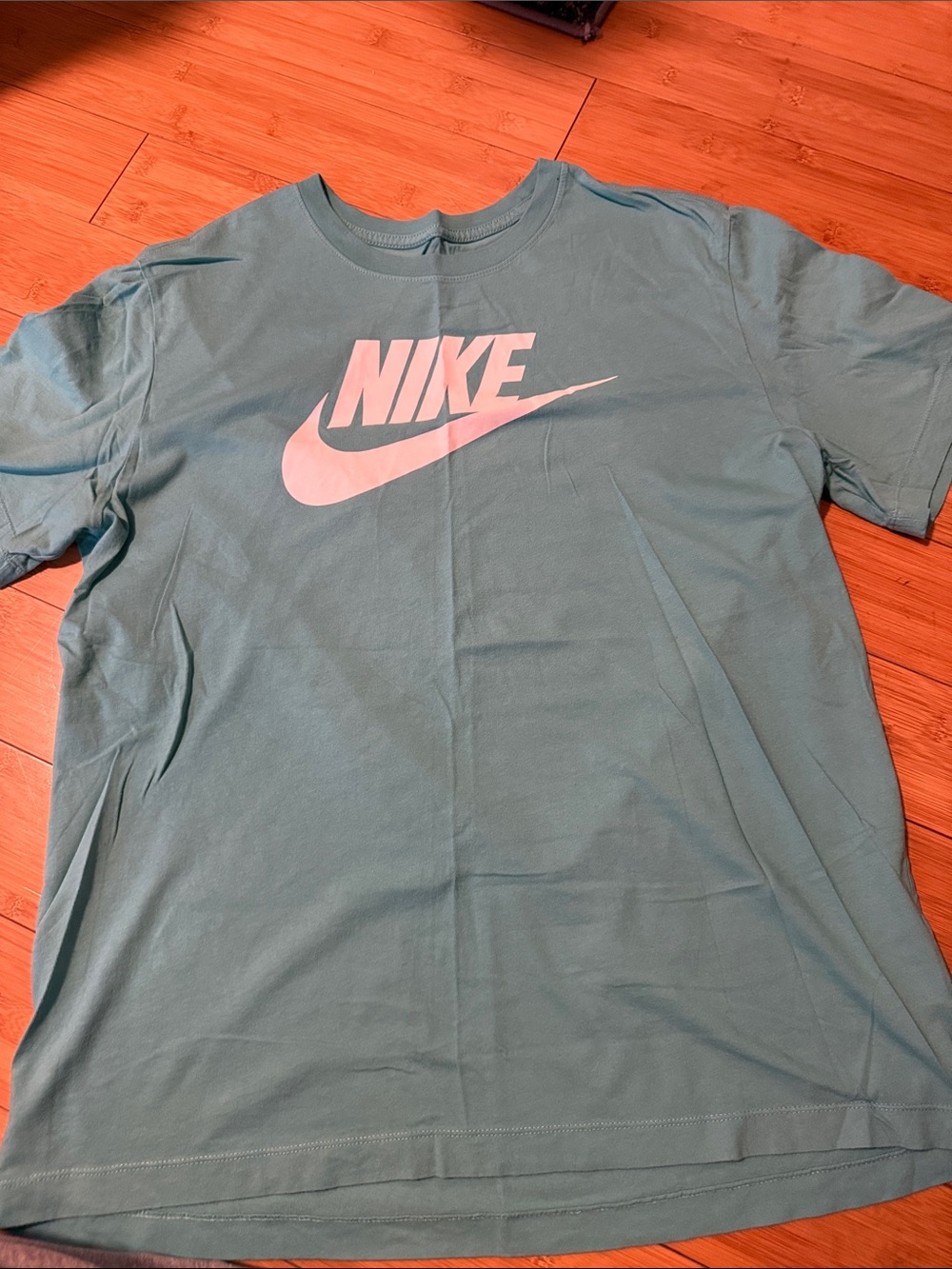 Nike Woman’s Teal Crewneck T-Shirt with White Swoosh Logo